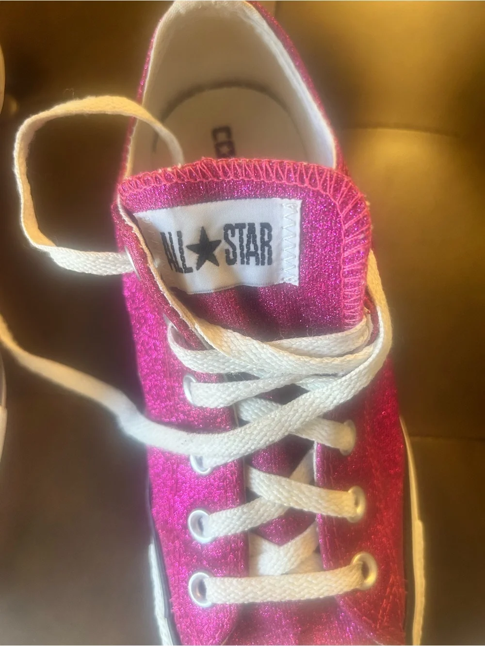 Women’s hot pink glitter Converse low tops